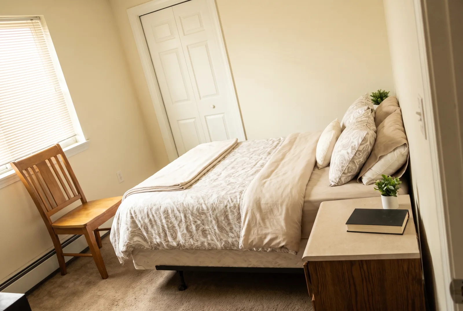 The same bedroom as a bright, tidy, professional RoomCast listing photo